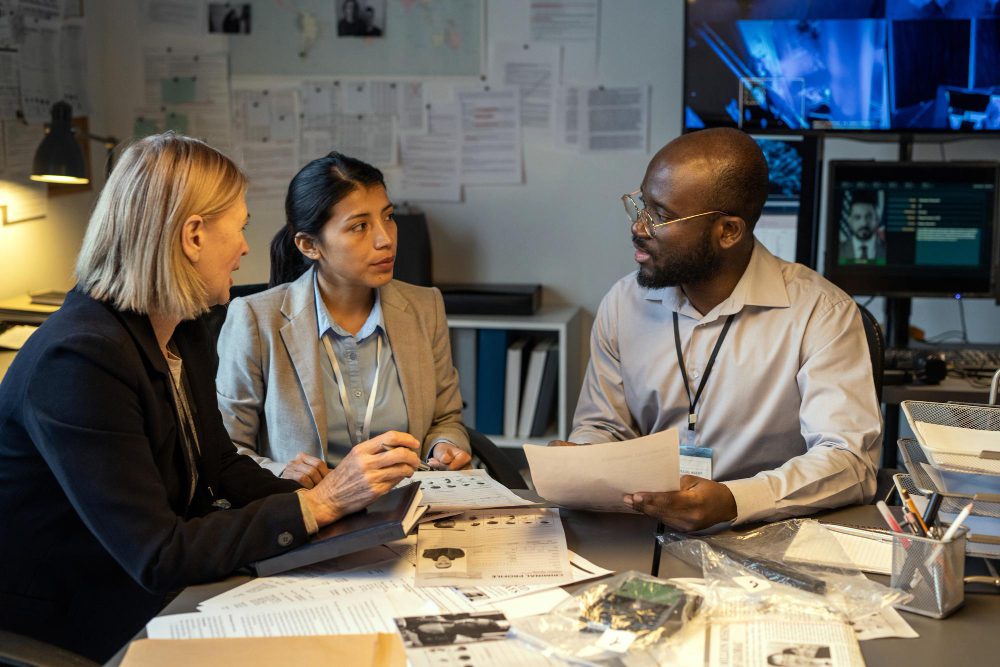 a group of people investigating for a case